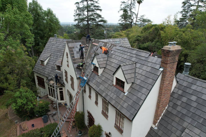 Green Ladder Roofing crew and fleet near the Rose Bowl in Pasadena