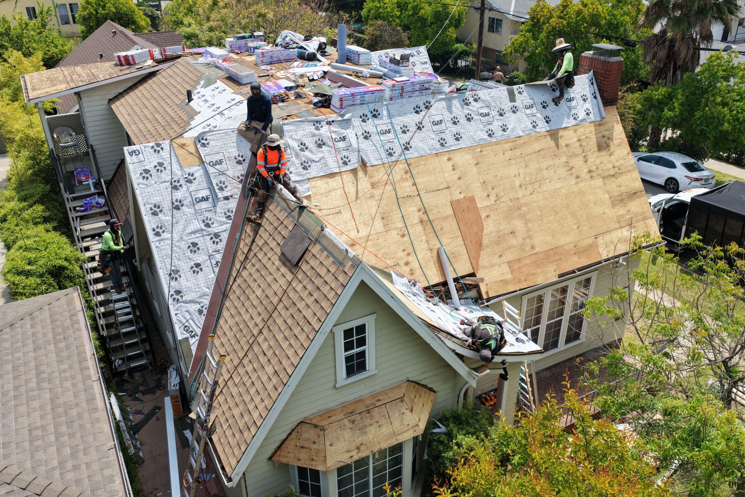 Green Ladder crew installing an asphalt shingle roof in Altadena